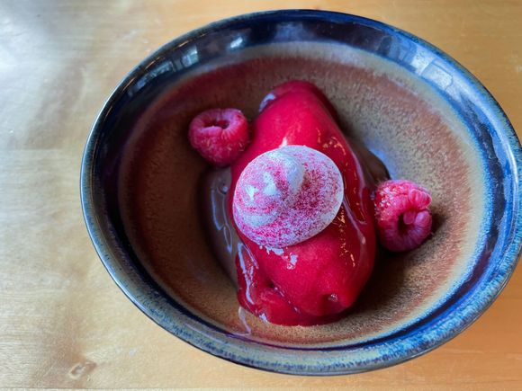 Dessert: raspberry sorbet on chocolate mousse with merengue. 