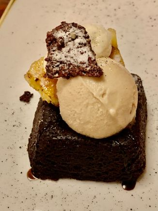 Chocolate cake with caramel ice cream and bananas 
