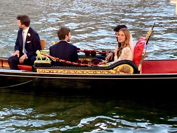 Lots of brides and grooms on gondolas, as seen from our hotel window 