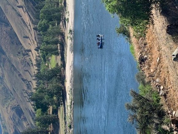 Bridesmaids being rowed in by my brother’s friend, Byron. 