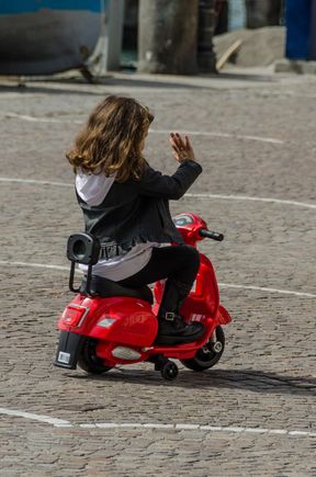 Little darling waves during her ride.
*Next:  the local fishing culture in Cetara.