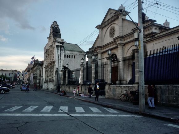The facade of the Holy Spirit cathedral, from the south side of the plaza.  Due mainly to earthquakes, the cathedral was damaged and reconstructed several times, until finally, at the end of the 19th century, they just gave up and started building the new one, which was slipped in behind the old facade.