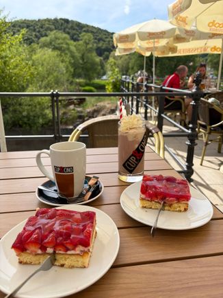 A busy cafe, tucked away in the back street on the river