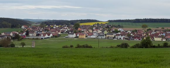 Villages on the bus route.   Canola in flower. 