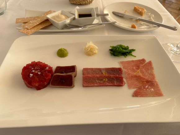 This is an assortment of raw and mostly raw tuna cuts:  From left:  Tuna tartar; tuna tatami (cooked on the outer edges); Sashimi de ventresca; parpetana, which was described to me as the palate, or the part of the tuna behind the throat....in any case it is delicious.  This is always cut much thinner than the belly (ventresca)