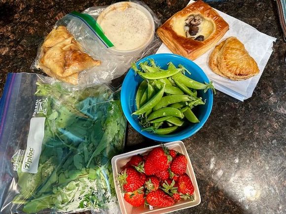 Farmers market finds:
Sugar snaps, strawberries, arugula, apricot tart, mushroom cheese pocket, samosas and Riata sauce.  