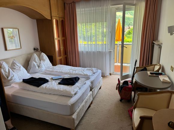 Our hotel room at Hotel Annabell - a spacious room with a terrace - and the most storage space we have had at any hotel ever. 