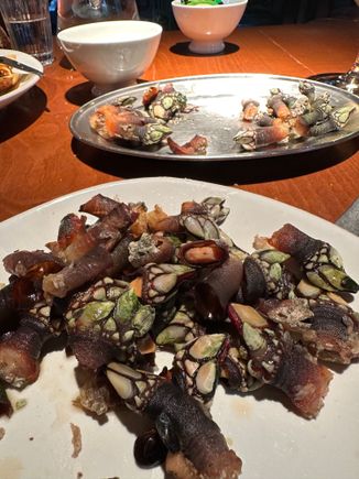 These are the much-vaunted percebes, sea barnacles, pried at tremendous peril by specialized percebeiros  who clamber down the wind-lashed cliffs to gather these morsels that sell for hundreds of euros in Madrid and other urban centers.  It is very much worthwhile to view videos and read about these brave souls; every village memorializes those who have lost their lives in the pursuit of a delicacy too expensive for most locals but much in demand by tourists, like ourselves. 