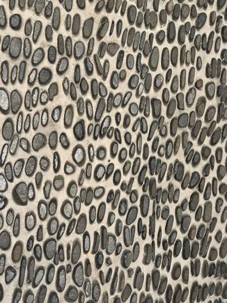 Gorgeous floors in public areas..stone inset into cement..must find out details