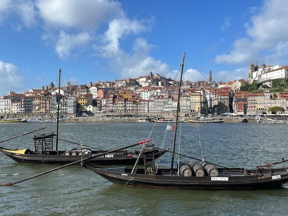 The city on the other side is called Gaia. It's home to tasting rooms for a lot of wine and port houses. Rabelos (historic boats used to transport wine/port barrels) line the Gaia side of the river. 