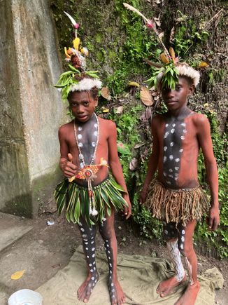 Boys in local dress at the barge bunkers