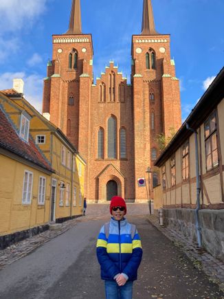 Birthday boy in front of the Roskilde cathedral 