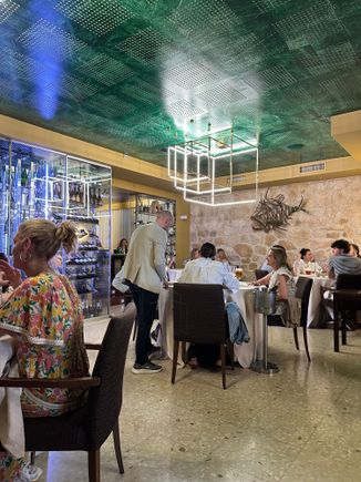 Front dining room on a Saturday night about 9pm; there is also a rear dining room where I think the many VIPs are seated.