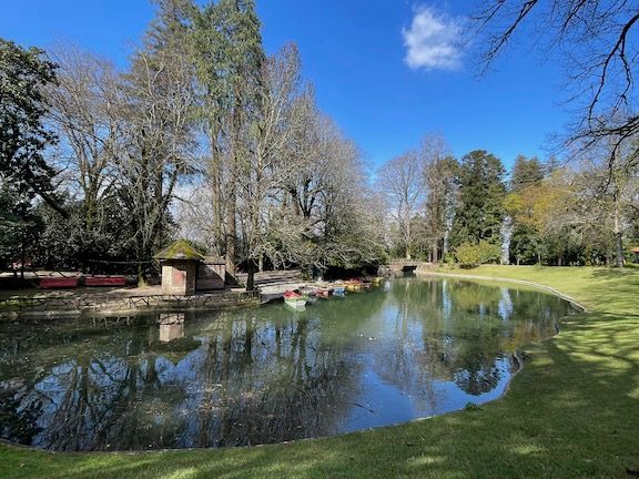 Behind the church, there is a park with some walking paths and a small lake