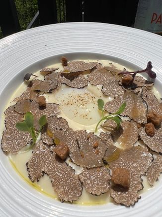 Potato soufflé with an egg and truffles.  I am still dreaming about this dish!