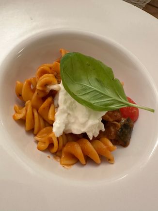 Fusillone with eggplant, Datterino tomatoes, and stratciatella cheese--also a half portion. (we each had a half portion of two different pastas)
