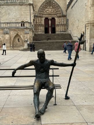 The city is statue filled; a pilgrim at rest