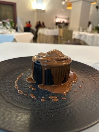 Also exquisite times ten.   Chocolate souffle with caramel ice cream.   Marvelous dinner for about 50 eurp.  