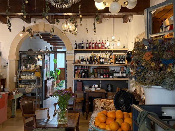 Those little coffee / wine bars that seem tiny, but have lots of little rooms, and even some garden spaces 