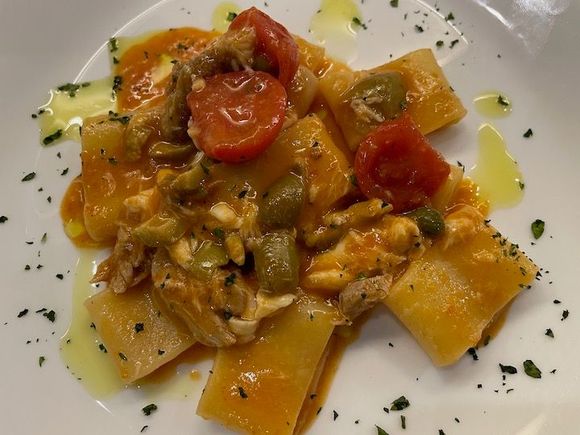 Paccheri alla Siracusana (capers, olives, cherry tomatoes, fish)
