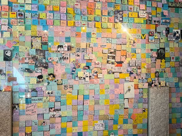  BTS's former dorm is now a cafe; this wall is covered in notes to the band