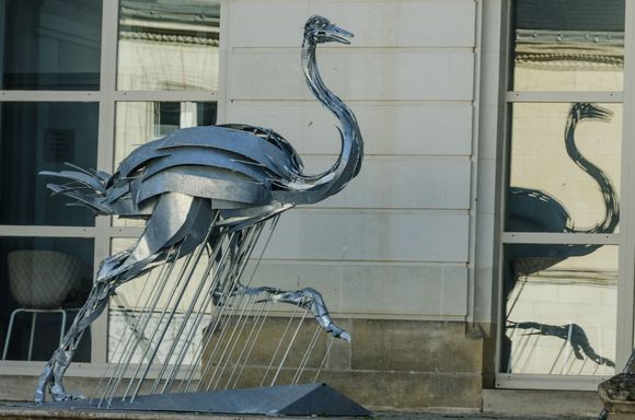 By the modest City Hall.