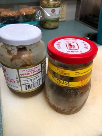 These are the two brands of sesame paste I have in my fridge now. I also will buy the Lan Chi brand.
