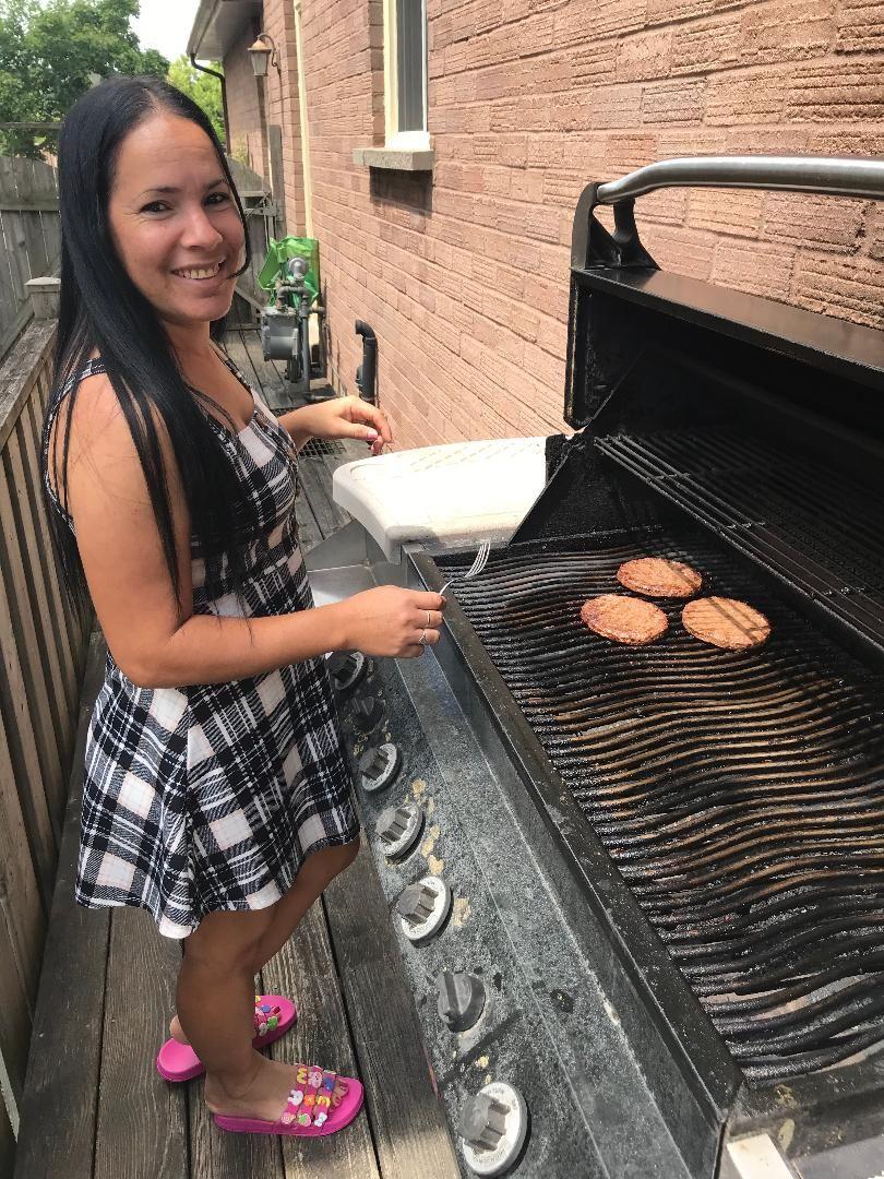 Yudith, my wife, working our Napoleon BBQ here in Canada this past summer via her TRV grilling our hamburguesas for lunch. Oje! She doesn't get a free ride - I make sure to always put her to work when she's here too. She loves it though!  