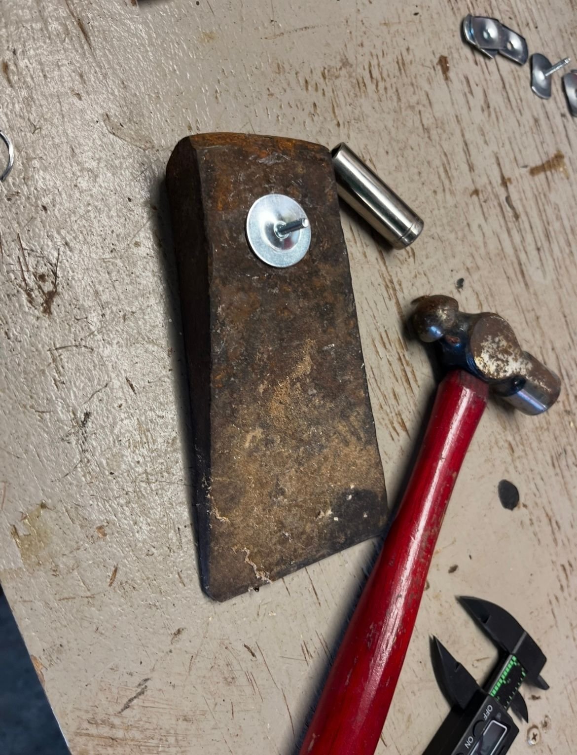 I put the bolt in the washer and used a deep socket to impregnate the washer to keep the same thickness 