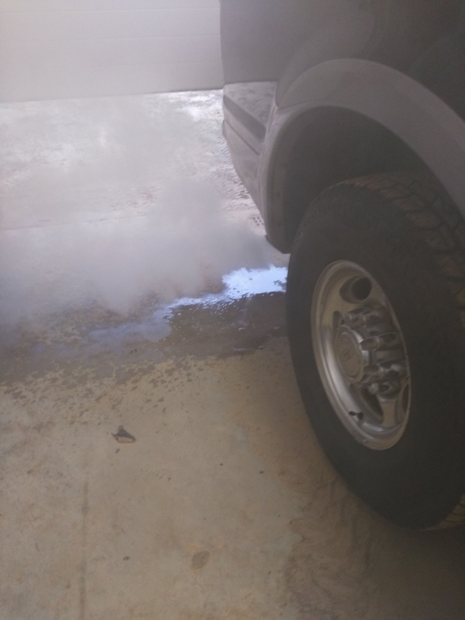 Lots of smoke and coolant coming from exhaust!!! Ford Truck