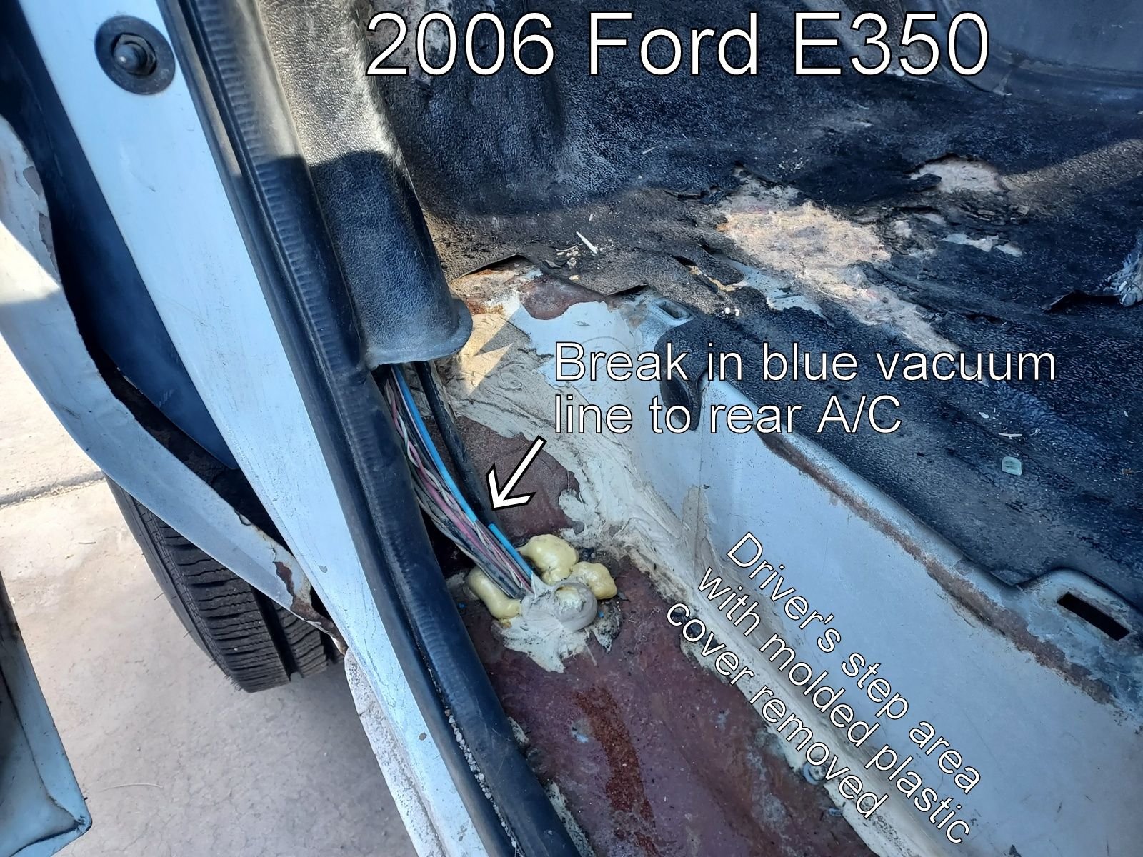 This is a rusty van. Spray foam was used to fill in the jagged holes around the harness 