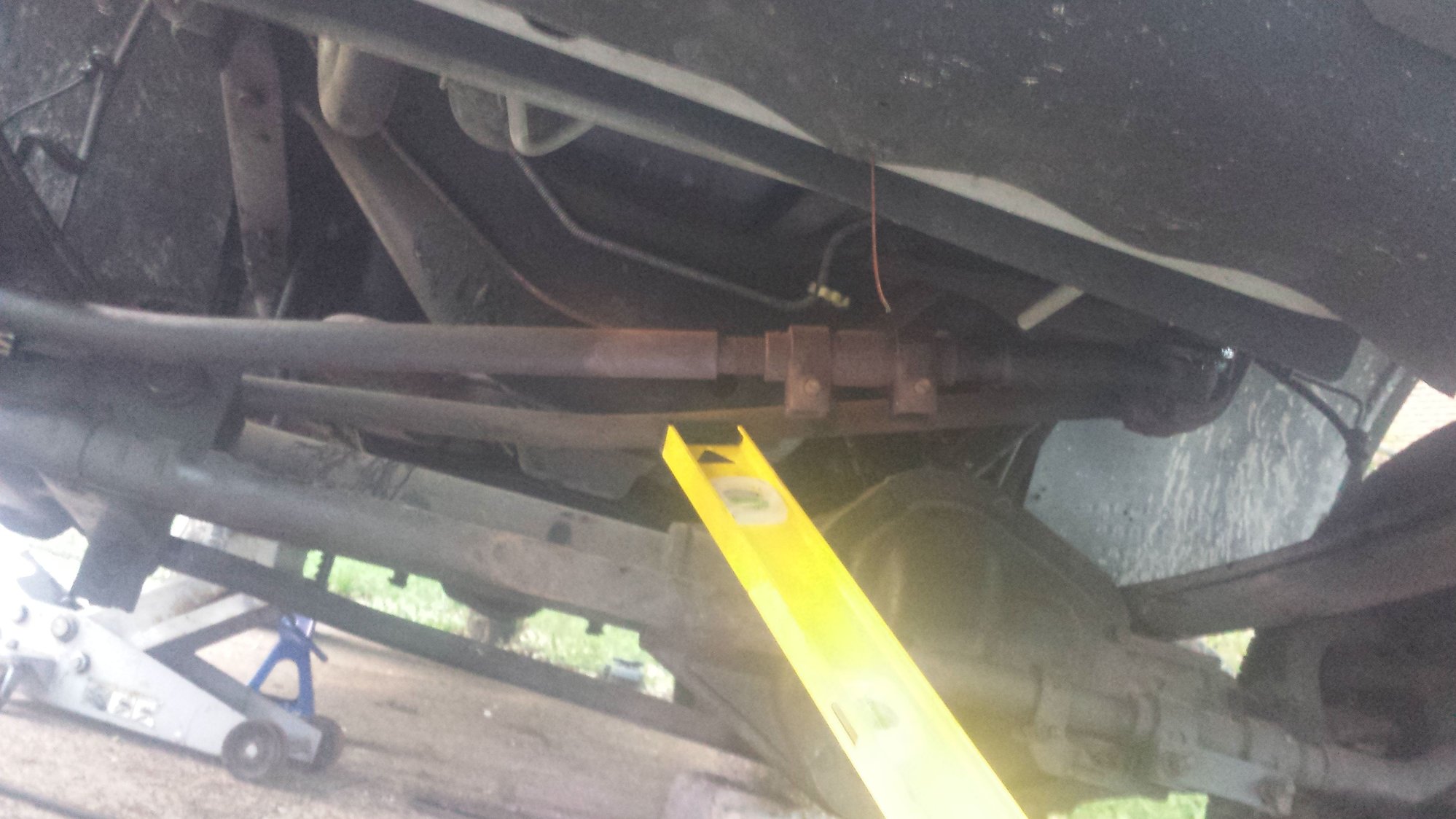 Suspension help needed! Front leaf springs? Track bar??? I have pics