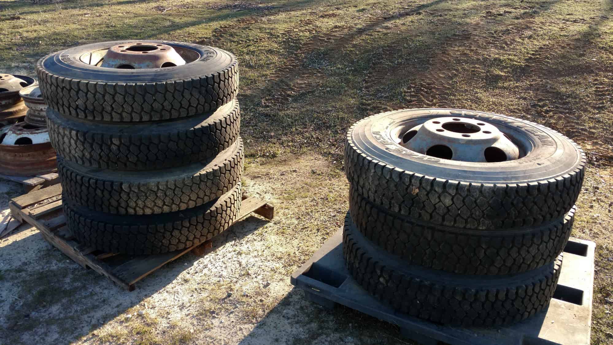 SIX LUG 22.5 rockwell rims (seven rims/ tires) with near ...