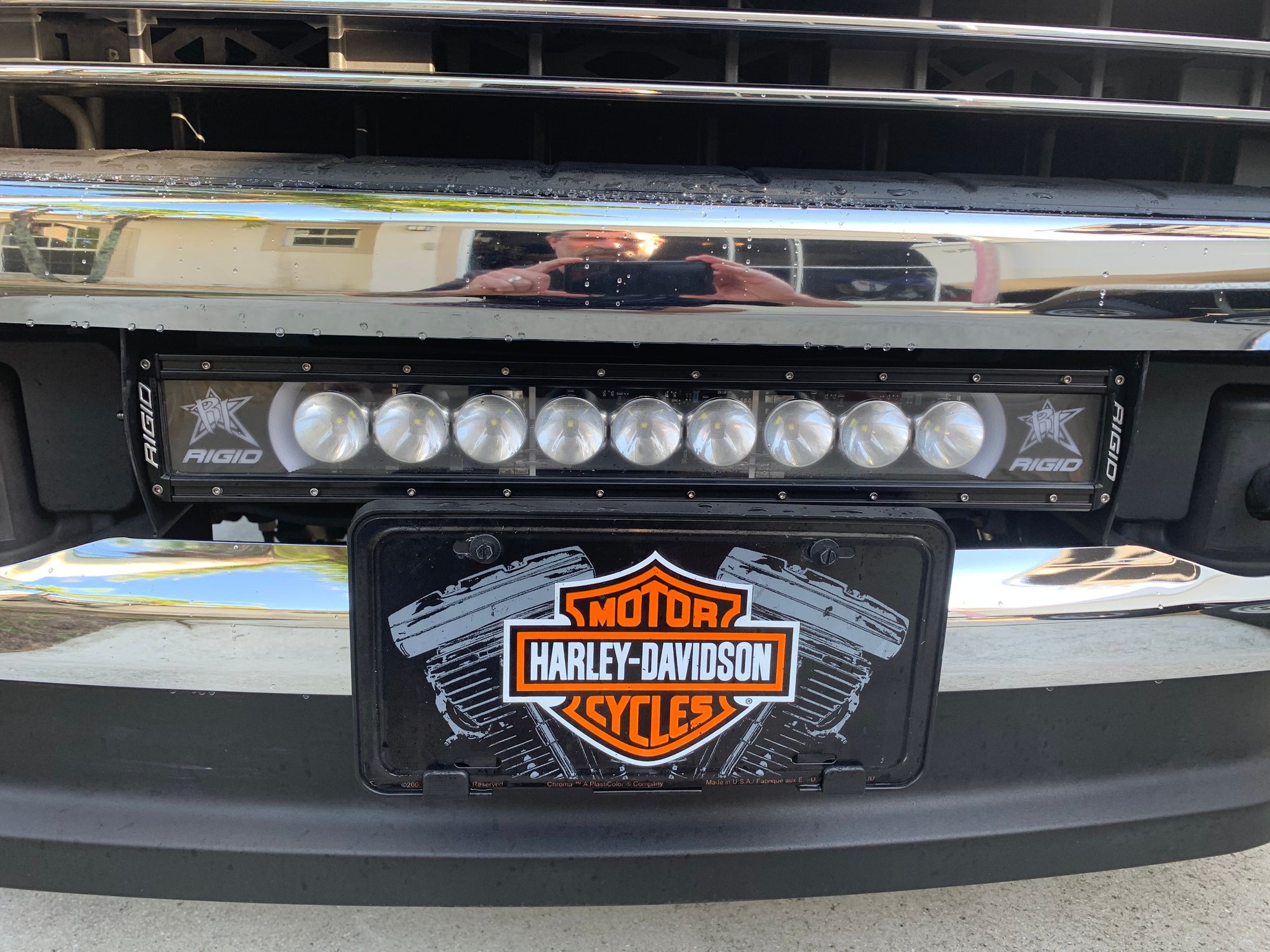 Cutting behind front license plate LED light bar install? Ford