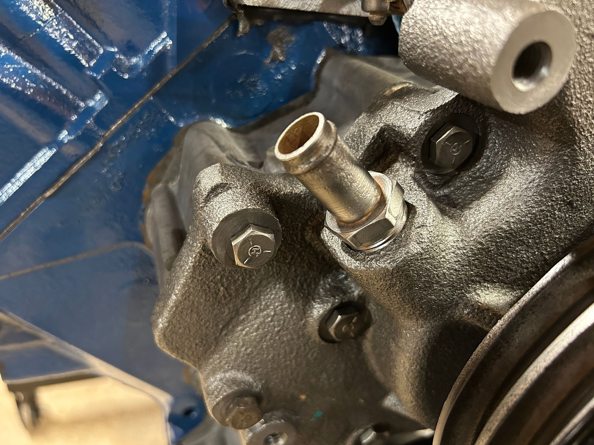 Then got it installed on the new pump then I jumped over to the exhaust manifolds. Got them up on my bench and was checking them with a straight edge.