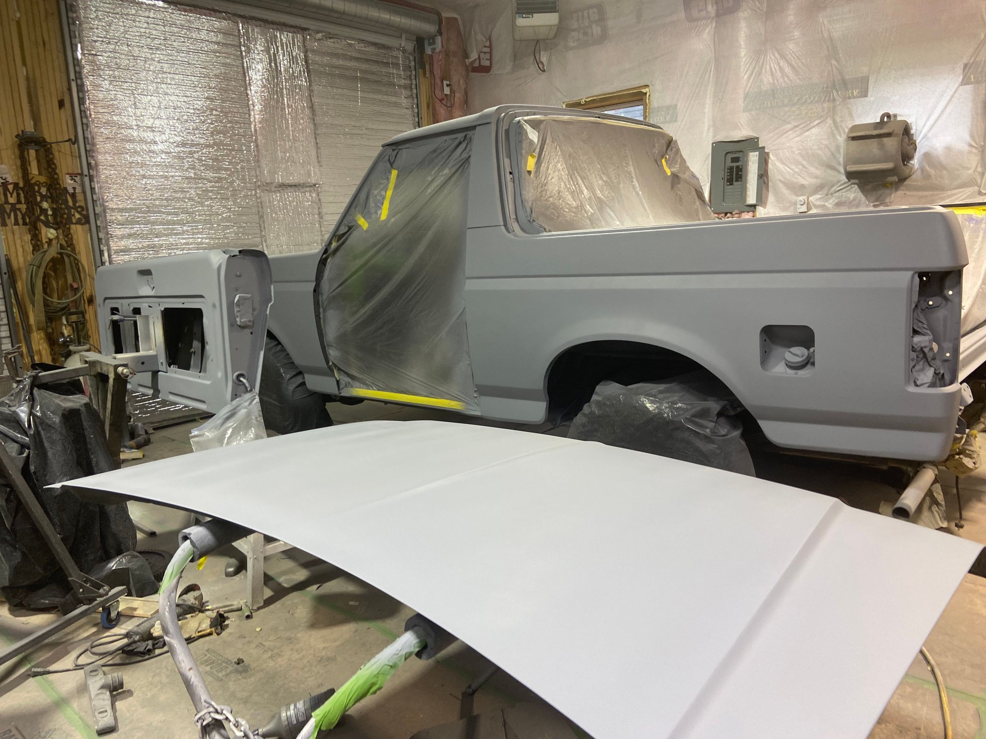 2k primer sprayed on Sunday. The plan is to shoot the color on the jambs and reassemble before I spray it out.