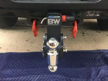 Thanks to the knowledge and ingenuity of forum members I was able to solve the problem of my safety chain hooks being too big for the slots in the factory hitch. Thanks to the member who suggested putting them together on the bench first. That made the installation on the truck easier.  