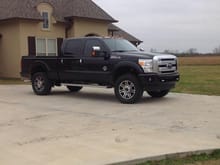 2013 F250 Platinum, Readylift 2/2.5 level lift.  35" Toyo Open Country MT