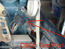 OBD I under driver side hood hinge