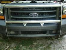 before removing grille and headlight bezels