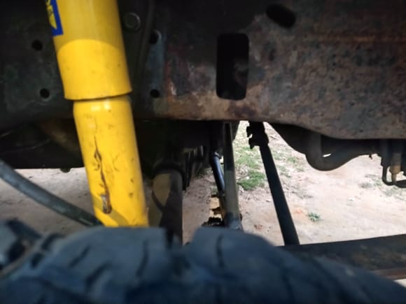 You may have to zoom in, but it definitely looks like it's bent in right where the collar is connected to both the tie rod and the tie rod end. 