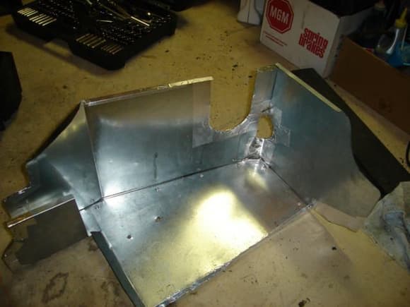 Cold air box after riveting and taping edges with aluminized duct tape.