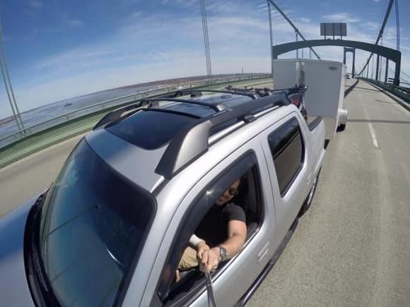 Taking a selfie with a selfie stick while driving on a bridge towing a trailer that your truck is under rated to pull.

Priceless