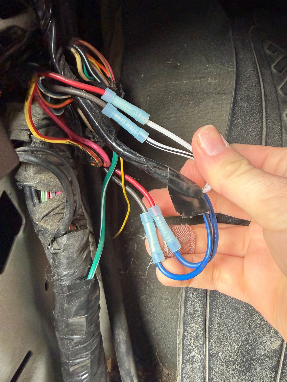red/brown wires spliced and going to unmarked module