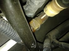 Looks like a plastic fitting that connects to a hose that's connect to the heater core if I'm rite  thanks 1.8ttony for telling me what to check now hopefully when I get that fixed no more liw coolant from the reservoir  just got to find out what that piece  is called