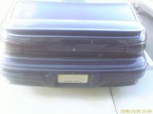 rear, blacked out tail lights and blacked out license plate