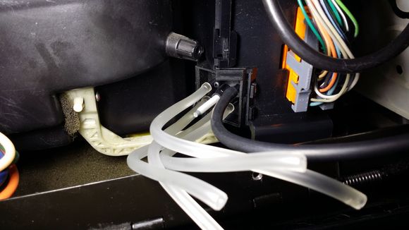 these are the tubes attached to the male nipples on the programmer, the black tube is the jumper switched out from the purple line tube that attaches to the top by the programmer itself, it is connected to the vacuum line by an orange splice