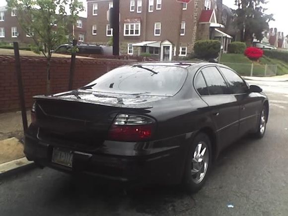 CLEARED TAIL LIGHTS AND PAINTED REAR REFLECTOR , 20%TINT