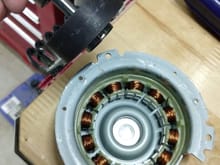 rotor pulled from stator.  Stator is glued down.