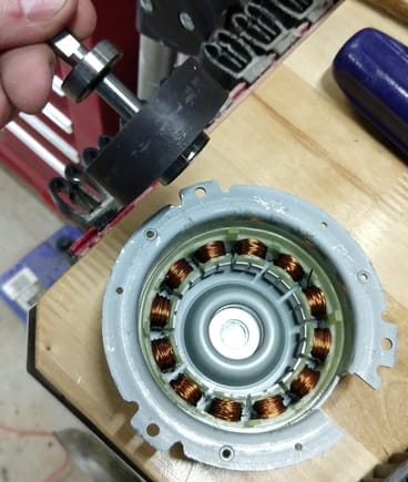 rotor pulled from stator.  Stator is glued down.